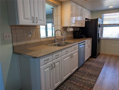 Attention Golfers, Beach Lovers & wanna be Retirees...a on Mainlands Golf Club in Florida - for sale on GolfHomes.com, golf home, golf lot