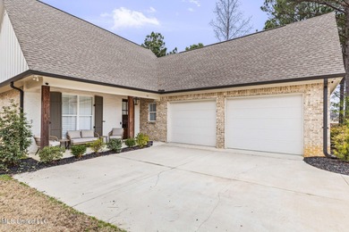 EXPERIENCE WATERFRONT LIVING AT ITS FINEST IN BEAUTIFUL LAKE on Lake Caroline Golf Club in Mississippi - for sale on GolfHomes.com, golf home, golf lot