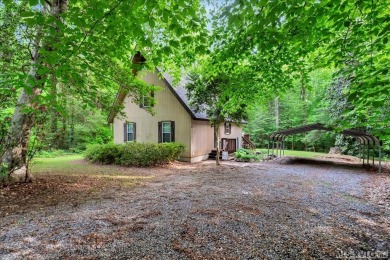 Cute A-frame tucked in the woods at the end of a cul-de-sac on Tanglewood Shores Golf Club in Virginia - for sale on GolfHomes.com, golf home, golf lot