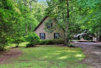Cute A-frame tucked in the woods at the end of a cul-de-sac on Tanglewood Shores Golf Club in Virginia - for sale on GolfHomes.com, golf home, golf lot