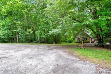 Cute A-frame tucked in the woods at the end of a cul-de-sac on Tanglewood Shores Golf Club in Virginia - for sale on GolfHomes.com, golf home, golf lot