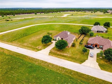 Escape to this well maintained residence nestled in a stunning on The Retreat in Texas - for sale on GolfHomes.com, golf home, golf lot