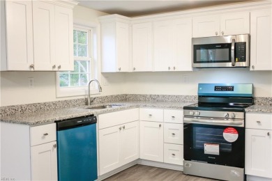 Welcome to this BEAUTIFULLY and FULLY renovated home right near on Red Wing Lake Golf Course in Virginia - for sale on GolfHomes.com, golf home, golf lot