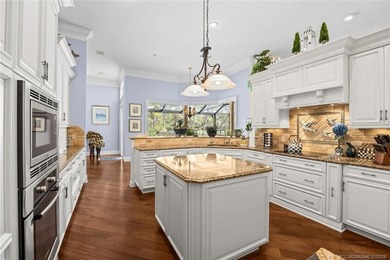 A true golfer's paradise, perfectly positioned on the 5th hole on PGA Golf Club in PGA Village in Florida - for sale on GolfHomes.com, golf home, golf lot