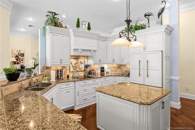 A true golfer's paradise, perfectly positioned on the 5th hole on PGA Golf Club in PGA Village in Florida - for sale on GolfHomes.com, golf home, golf lot