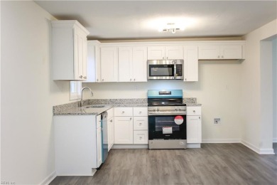 Welcome to this BEAUTIFULLY and FULLY renovated home right near on Red Wing Lake Golf Course in Virginia - for sale on GolfHomes.com, golf home, golf lot