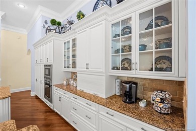 A true golfer's paradise, perfectly positioned on the 5th hole on PGA Golf Club in PGA Village in Florida - for sale on GolfHomes.com, golf home, golf lot