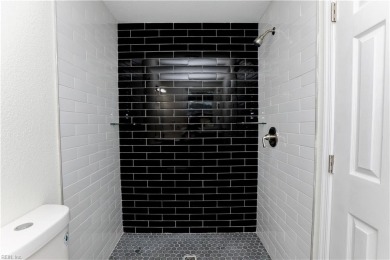 Welcome to this BEAUTIFULLY and FULLY renovated home right near on Red Wing Lake Golf Course in Virginia - for sale on GolfHomes.com, golf home, golf lot