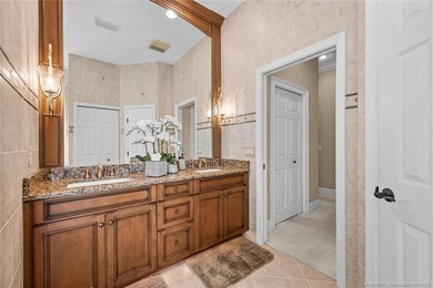 A true golfer's paradise, perfectly positioned on the 5th hole on PGA Golf Club in PGA Village in Florida - for sale on GolfHomes.com, golf home, golf lot