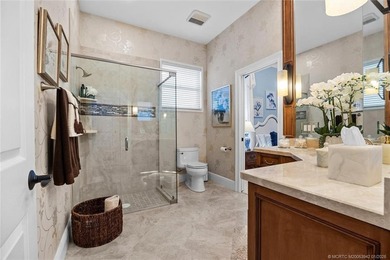 A true golfer's paradise, perfectly positioned on the 5th hole on PGA Golf Club in PGA Village in Florida - for sale on GolfHomes.com, golf home, golf lot