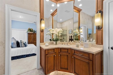 A true golfer's paradise, perfectly positioned on the 5th hole on PGA Golf Club in PGA Village in Florida - for sale on GolfHomes.com, golf home, golf lot