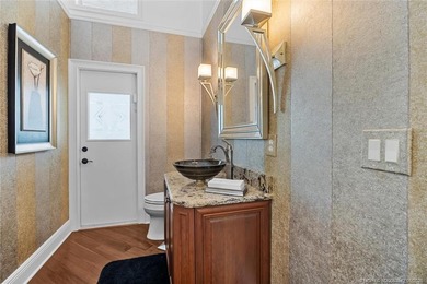 A true golfer's paradise, perfectly positioned on the 5th hole on PGA Golf Club in PGA Village in Florida - for sale on GolfHomes.com, golf home, golf lot