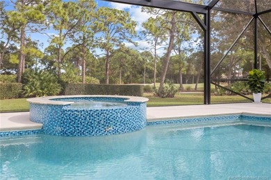 A true golfer's paradise, perfectly positioned on the 5th hole on PGA Golf Club in PGA Village in Florida - for sale on GolfHomes.com, golf home, golf lot