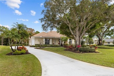 A true golfer's paradise, perfectly positioned on the 5th hole on PGA Golf Club in PGA Village in Florida - for sale on GolfHomes.com, golf home, golf lot