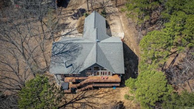 Experience the epitome of lakeside living with this stunning on  in Arkansas - for sale on GolfHomes.com, golf home, golf lot