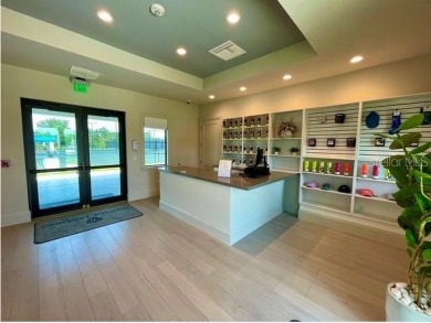 Own this first-floor DiAngelo veranda with deeded golf on Heritage Landing Golf  in Florida - for sale on GolfHomes.com, golf home, golf lot