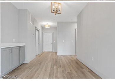 Welcome to Unit 126, a beautifully appointed second-level corner on Gulf Hills Golf Club in Mississippi - for sale on GolfHomes.com, golf home, golf lot