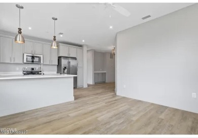 Welcome to Unit 126, a beautifully appointed second-level corner on Gulf Hills Golf Club in Mississippi - for sale on GolfHomes.com, golf home, golf lot