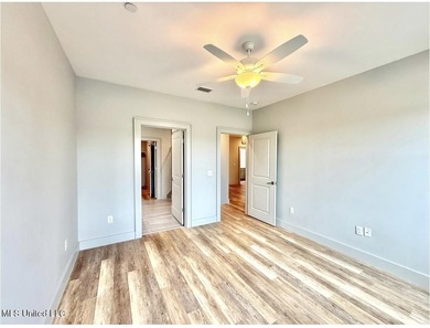 Welcome to Unit 126, a beautifully appointed second-level corner on Gulf Hills Golf Club in Mississippi - for sale on GolfHomes.com, golf home, golf lot