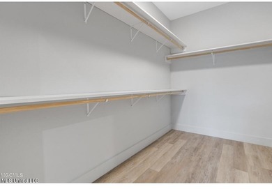 Welcome to Unit 126, a beautifully appointed second-level corner on Gulf Hills Golf Club in Mississippi - for sale on GolfHomes.com, golf home, golf lot