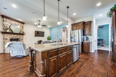 Welcome to this stunning Highland Home in the heart of The on The Tribute At the Colony in Texas - for sale on GolfHomes.com, golf home, golf lot