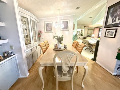 This charming 2BR/2BA home in Barefoot bay, combines comfortable on Barefoot Bay Golf Course in Florida - for sale on GolfHomes.com, golf home, golf lot