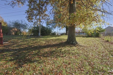 This beautiful home has been completely redone. New flooring on Southwind Golf Course in Kentucky - for sale on GolfHomes.com, golf home, golf lot