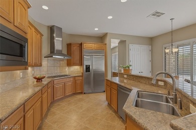 Welcome home to luxury living inside guard-gated Club Aliante! on Aliante Golf Club in Nevada - for sale on GolfHomes.com, golf home, golf lot