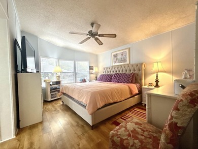 This charming 2BR/2BA home in Barefoot bay, combines comfortable on Barefoot Bay Golf Course in Florida - for sale on GolfHomes.com, golf home, golf lot