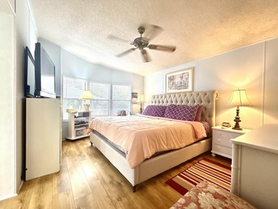 This charming 2BR/2BA home in Barefoot bay, combines comfortable on Barefoot Bay Golf Course in Florida - for sale on GolfHomes.com, golf home, golf lot