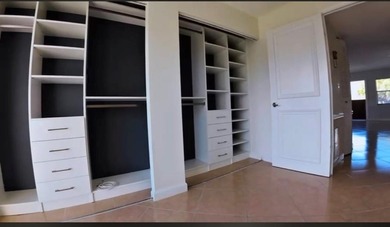 **55+ Community Nice kitchen- spectacular closet in bedroom- on Sunrise Lakes Phase III in Florida - for sale on GolfHomes.com, golf home, golf lot