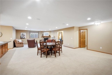 Experience luxurious one-level living in this rarely available on Rush Creek Golf Club in Minnesota - for sale on GolfHomes.com, golf home, golf lot