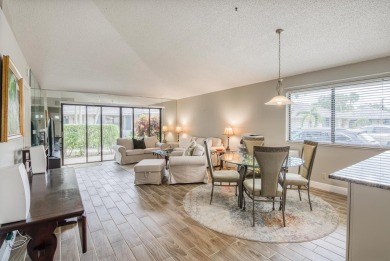 Discover this beautifully updated 2-bedroom, 2-bathroom home in on PGA National Golf Club in Florida - for sale on GolfHomes.com, golf home, golf lot