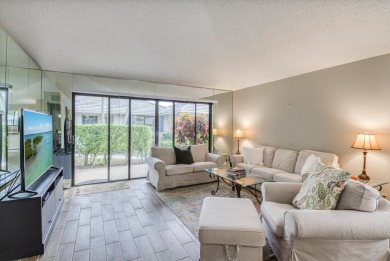 Discover this beautifully updated 2-bedroom, 2-bathroom home in on PGA National Golf Club in Florida - for sale on GolfHomes.com, golf home, golf lot