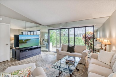 Discover this beautifully updated 2-bedroom, 2-bathroom home in on PGA National Golf Club in Florida - for sale on GolfHomes.com, golf home, golf lot