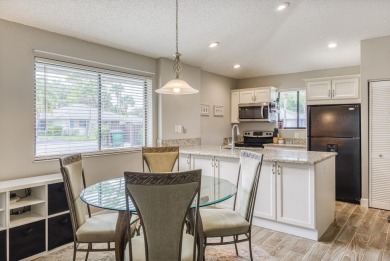 Discover this beautifully updated 2-bedroom, 2-bathroom home in on PGA National Golf Club in Florida - for sale on GolfHomes.com, golf home, golf lot