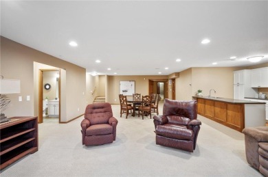 Experience luxurious one-level living in this rarely available on Rush Creek Golf Club in Minnesota - for sale on GolfHomes.com, golf home, golf lot