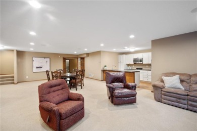 Experience luxurious one-level living in this rarely available on Rush Creek Golf Club in Minnesota - for sale on GolfHomes.com, golf home, golf lot