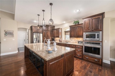Experience effortless luxury living in this stunning reverse 1 on Staley Farms Golf Club in Missouri - for sale on GolfHomes.com, golf home, golf lot
