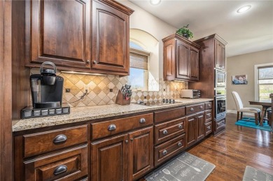 Experience effortless luxury living in this stunning reverse 1 on Staley Farms Golf Club in Missouri - for sale on GolfHomes.com, golf home, golf lot