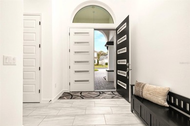 One or more photo(s) has been virtually staged. (Dining Room on Providence Golf Club in Florida - for sale on GolfHomes.com, golf home, golf lot