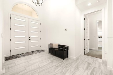 One or more photo(s) has been virtually staged. (Dining Room on Providence Golf Club in Florida - for sale on GolfHomes.com, golf home, golf lot