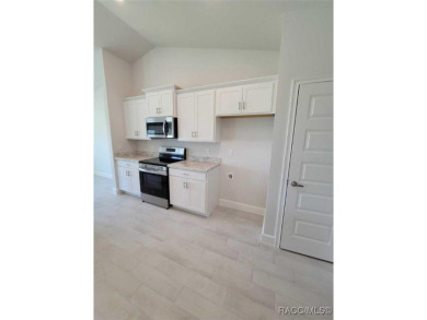 THIS HOME QUALIFIES FOR A LOW INTEREST RATE BUYDOWN WHEN BUYER on Citrus Springs Country Club in Florida - for sale on GolfHomes.com, golf home, golf lot
