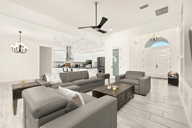 One or more photo(s) has been virtually staged. (Dining Room on Providence Golf Club in Florida - for sale on GolfHomes.com, golf home, golf lot