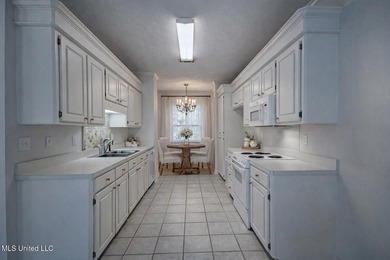 Charming home. Great location! 3 bedroom 2.5 bath home with on Castlewoods Golf Club in Mississippi - for sale on GolfHomes.com, golf home, golf lot