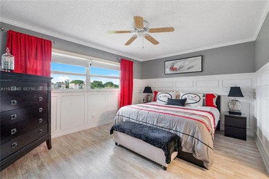 Beautifully furnished unit in 55+ community overlooking the golf on Oriole Golf and Tennis Club in Florida - for sale on GolfHomes.com, golf home, golf lot