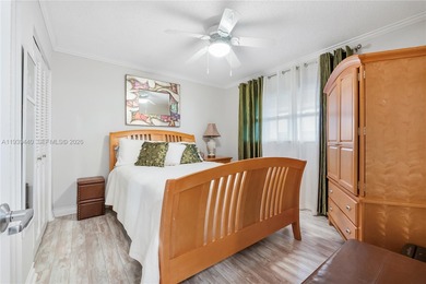 Beautifully furnished unit in 55+ community overlooking the golf on Oriole Golf and Tennis Club in Florida - for sale on GolfHomes.com, golf home, golf lot