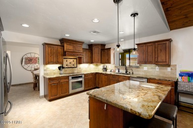 Two properties in one! You need to see this place in person on London Bridge Golf Course in Arizona - for sale on GolfHomes.com, golf home, golf lot