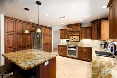 Two properties in one! You need to see this place in person on London Bridge Golf Course in Arizona - for sale on GolfHomes.com, golf home, golf lot