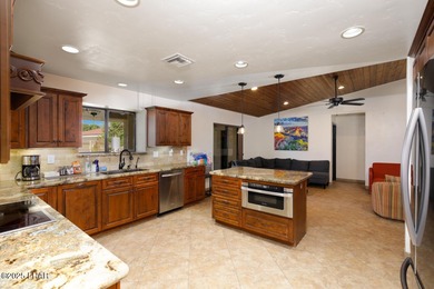 Two properties in one! You need to see this place in person on London Bridge Golf Course in Arizona - for sale on GolfHomes.com, golf home, golf lot